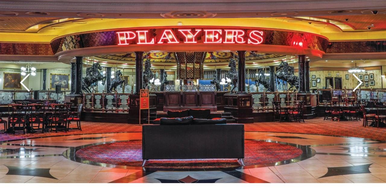 The Carousel Casino — Players restaurant with neon sign